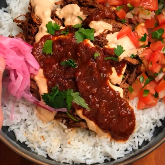 Shredded Mexican Beef Bowl. Rice. Charred Sweet Corn Salsa (L)