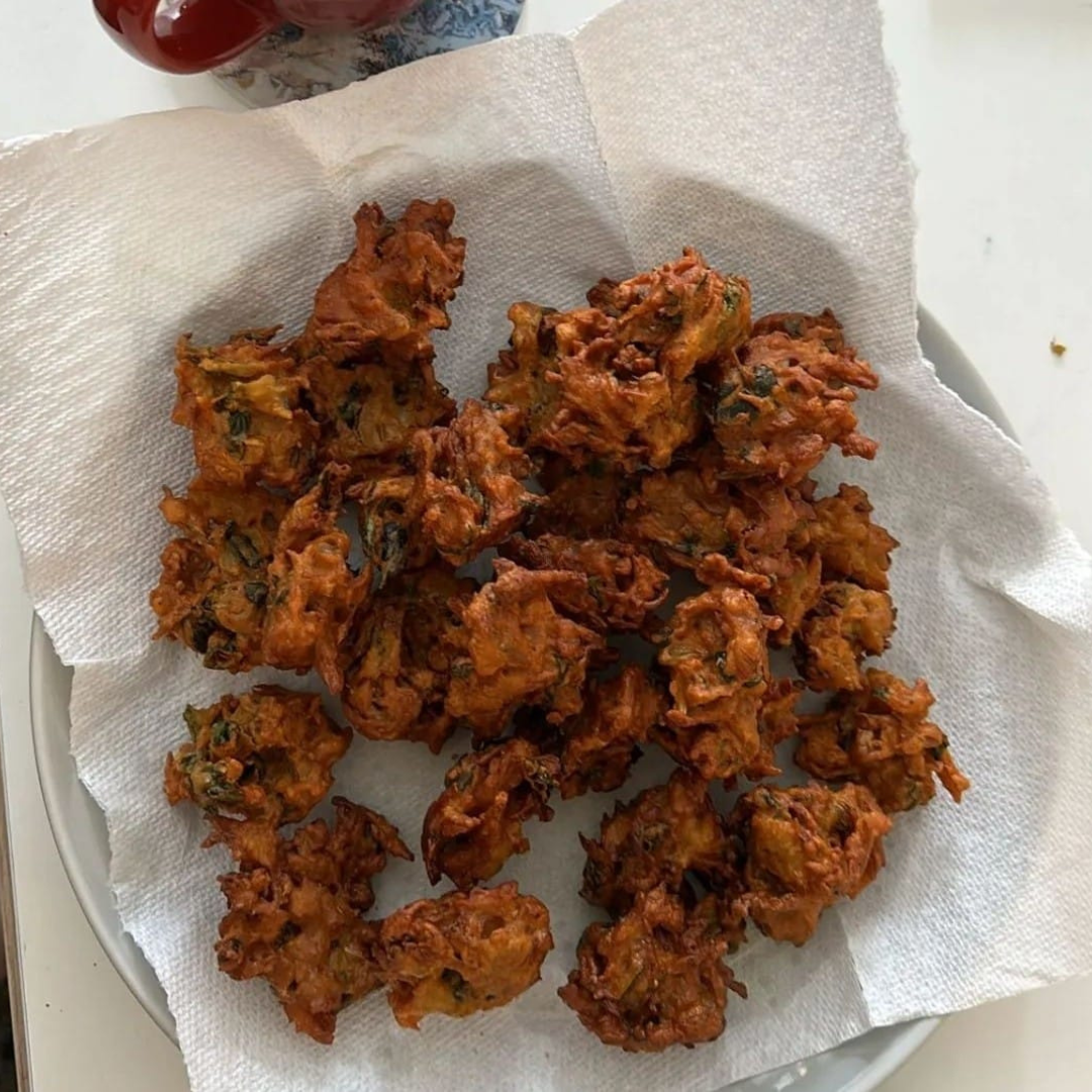 Homemade Veg Pakora. Chilli Jam. Pilau Rice. Torn Naan Croutons