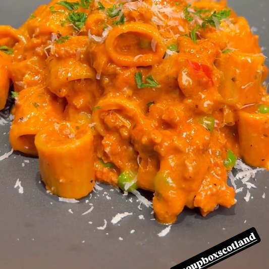 NYC Style Spicy Italian Sausage Pasta. Creamy Tomato Sauce. Peas (L)