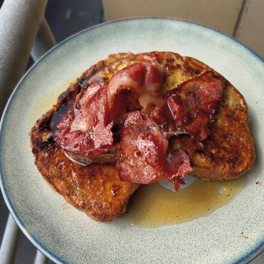 Brioche French Toast with Smoked Crispy Bacon. Maple Syrup Pot