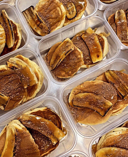 Chocolate Chip Protein Pancakes. Caramelised Banana. Nutella Drizzle. Hazelnuts